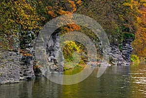 Rocky cliff of mountain river background