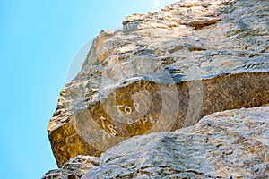 Rocky cliff or rock formation equipped for climbing