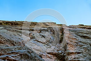 Rocky cliff or rock formation equipped for climbing