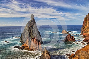 Rocky cliffs on the shore of the island of Madeira, Portugal. This amazing place is Ponta de Sao Lourenco. The most beautiful