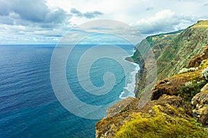 Rocky coast of the Atlantic ocean at Madeira archipelago in Portugal