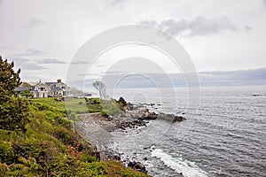 Rocky coast and beach house in York Maine