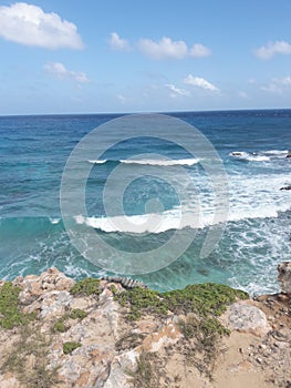 Rocky coast and blue ocean and sky Isla Mujeres Cancun Quintana Roo Mexico travel tourism South Point Punta Sur