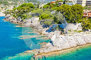 Rocky coast in Camogli, Italy. Aerial view on Adriatic seaside, liguria.