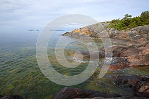 Rocky coast of Gangut in the morning of June. Hanko, Finland