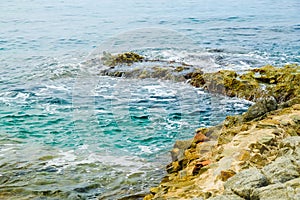 Rocky coast near the city beach in Lloret de Mar, Costa Brava.Concept of rest