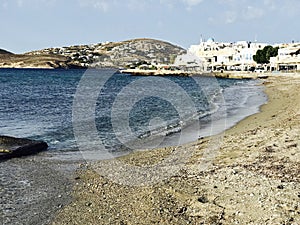 The rocky coast of Paros Greece is filled with deep browns and blues — GREECE