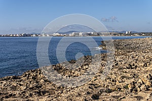 Rocky coast of the tourist resort of Sa Coma