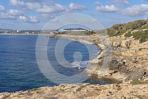 Rocky coast of the tourist resort of Sa Coma