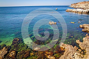 Rocky coast of the transparent Black Sea