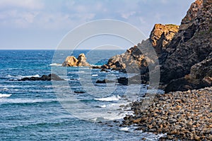 Rocky coast and turquoise Mediterranean Sea.