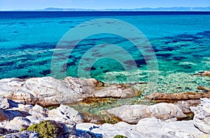 Rocky coast and turquoise sea in Greece