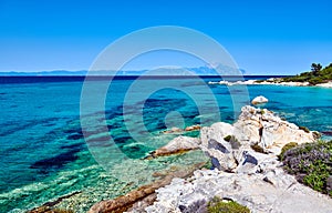 Rocky coast and turquoise sea in Greece