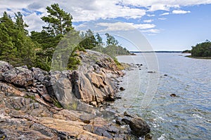 Rocky coastal view and Gulf of Finland, trees, shore and sea, Kopparnas-Klobbacka area