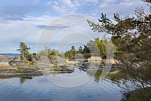 Rocky coastal view and sea in spring, Foglo, Aland islands, Finland photo