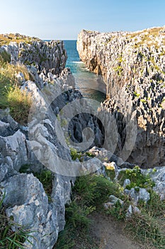 Rocky coastline in the Acantilados de Guadamia area, in Asturias northern Spain