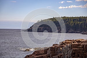 Rocky coastline along the ocean in Maine, United States