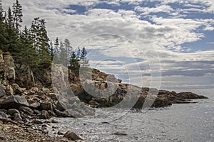 Rocky coastline along the ocean in Maine, United States