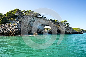 Rocky coastline of Arco di San Felice, Puglia, Italy photo