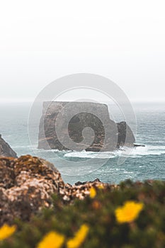 Rocky coastline of the Atlantic Ocean in the south-west of Portugal in the Algarve region. Exploring the beautiful rugged nature