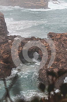 Rocky coastline of the Atlantic Ocean in the south-west of Portugal in the Algarve region. Exploring the beautiful rugged nature