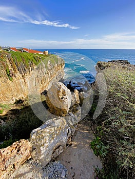 Rocky coastline in Cascais, Portugal called the Boca de Inferno