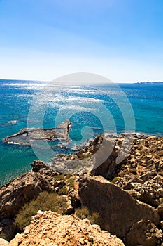 Rocky coastline, crystal clear water and blue sky. East side of Rhodes Island. Greece.