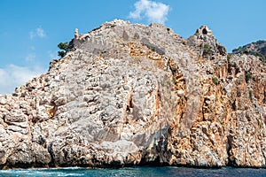Rocky coastline Dil Varna Burnu cape of Alanya Promontorium in Turkey photo