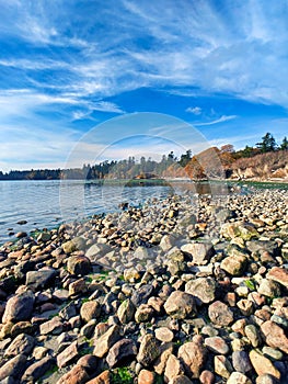 False Bay in San Juan Island, WA, refilling after low tide on a sunny day photo