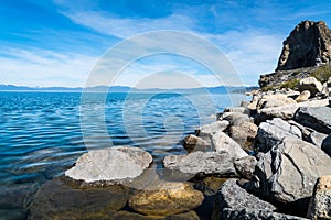 Rocky coastline at Lake Tahoe California Blue Waters crisp clear air photo