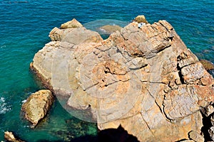 Rocky coastline in Town of 1770 in Australia.