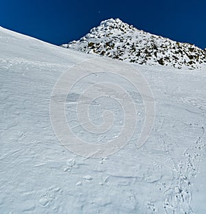 Rocky Derese hill summit in winter Nizke Tatry mountains in Slovakia