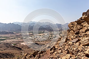 Rocky and dry landscape of Hatta town from above, seen from Hajar Mountains, United Arab Emirates