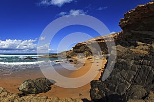 Rocky escarpments at Jarugo beach, west coast of Fuerteventura photo