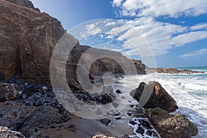 rocky escarpments at Tebeto Beach in the municipality of La Oliva photo