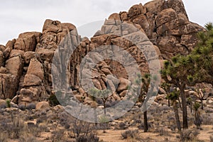 Rocky formations against a cloudy sky at Joshua Tree National Park in California