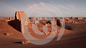 Rocky formations in the Dasht e Lut desert against sunset. Nature of Iran. Persia.