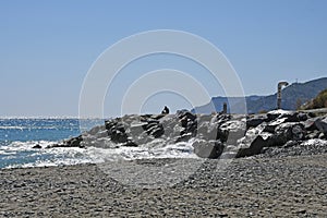 Rocky Headland and Shingle Beach, Savona, Liguria, Italy