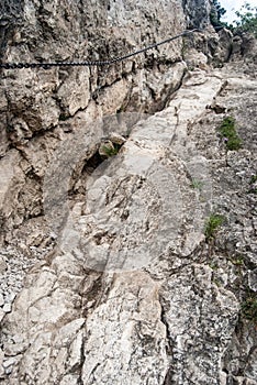 Rocky hiking trail with chain on Maly Rozsutec in Mala Fatra mountains