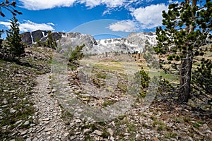 Rocky hiking trail leading into the 20 Lakes Basin backpacking Hoover Wilderness area of the Eastern Sierra Nevada Mountains of