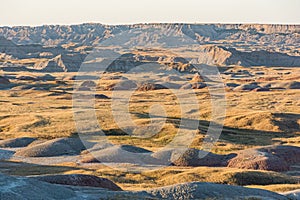 Rocky hill in a desolated area at sunrise in Badlands, South Dakota