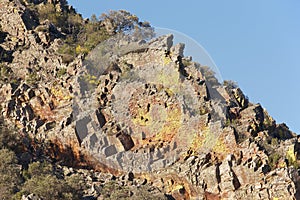 Rocky hill with lichen landscape in Cabaneros natural park, Spain photo