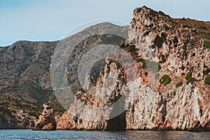Rocky island with grotto in Aegean sea landscape travel in Turkey nature beautiful destinations