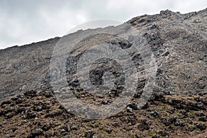 Rocky landscape in Tongariro National park near Whakapapa village and ski resort in summer