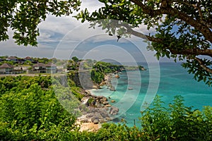 Rocky ledge on coastline, Jimbaran, Bali, Indonesia photo