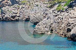 Rocky Mediterranean coast line at hot summer day