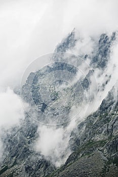 Rocky misty mountain range. Fine art shot.