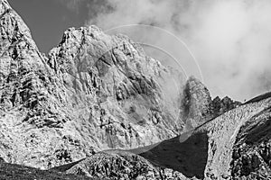 Rocky mountain in black and white with fog