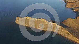 Rocky mountain coast bay aerial view. Shot. Beautiful landscape. Blue clear ocean sea water next to cliff Corfu Greece