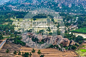 Rocky mountain with paddy field shot is taken at Anjeyanadri Hill hampi karnataka india